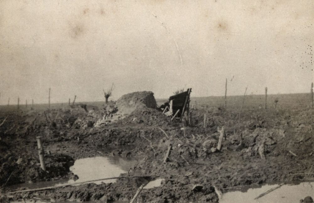 The view from Gravenstafel Ridge near Kansas Farm, Passchendaele, including the remains of a German pillbox, 1917.